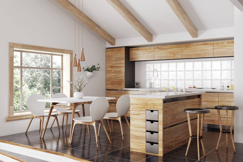 Cozinha com uma parede com tijolos de vidro garantindo iluminação natural para o ambiente