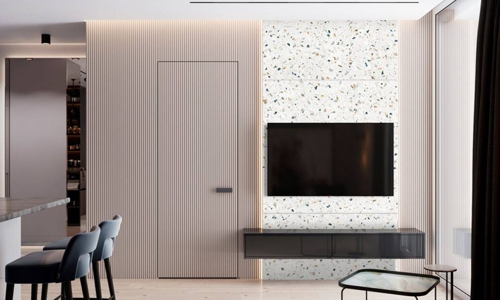 granilite branco aplicado em paredes de sala de tv e cozinha de conceito aberto